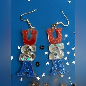 USA earrings. New/ Never used